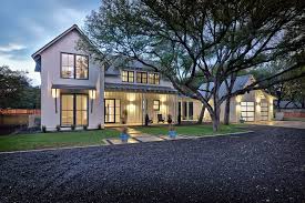 We have a long driveway and from the road you only see the side of our garage and our front porch(the house is hidden behind the garage from the street). 30 Homes That Show Off Their Top Notch Modern Driveway