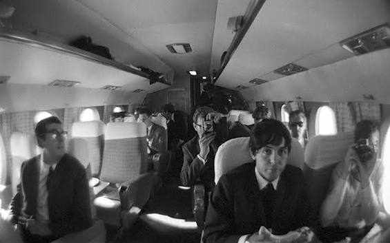 The Beatles on their private plane during the 1964 world tour. Photo taken by George Harrison.