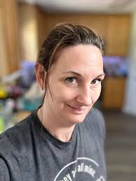 This wind is really bad for my hair do.