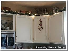 Above the kitchen cabinets decorations garland decorating. Christmas Decoration Ideas For Above Kitchen Cabinets Ecsac
