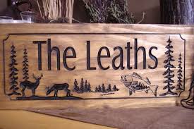 Our 30 x 14 cedar sign sells for $185.00 (plus $20.00 shipping). Wooden Carved Ranch Cabin Sign Last Name Family Address Plaque Etsy Cabin Signs Carved Signs Wood Cabin Signs