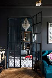 The dark interior let the home owners to add their personal touch to the overall design instead of just painting walls with different. The Unique Combination Of English Style And Dark Interiors