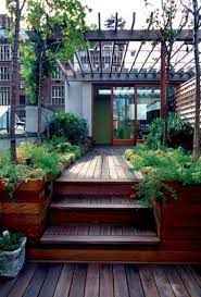 A touch of color like in the red and yellow flowers here always makes great landscape design sense. 45 Modern Deck And Patio Ideas And Designs Renoguide Australian Renovation Ideas And Inspiration