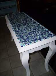 Clear bonding gels can be a very strong adhesives. Seaglass Table Top I Want To Make One Of These As A Bar Top For My Wedding One Day Along With Drift Wood S Sea Glass Mosaic Sea Glass Crafts