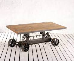 We actually do not use the wheels as this made it feel a little corporate and weren't necessary. Kraft Tree Wood Rolling Science Crank Mechanism Coffee Table With Wheels For Hotel Id 14621063348