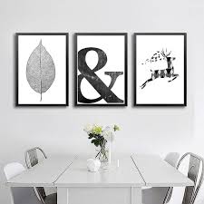 This memory wall is affordable to recreate and allows you to showcase all of your loved ones. Black White Nordic Canvas Art Scandinavian Wall Art Diy Canvas Wall Art Trendy Wall Art