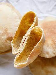Lay pita bread into hot skillet and cook until bread begins to puff up and bottom has brown spots and blisters, about 3 minutes. Pita Bread Whole Wheat Pita Bread Oven Stovetop Method