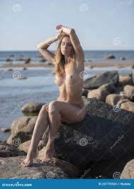 Young Beautiful Naked Woman Posing on a Stone Near the Sea Stock Image -  Image of natural, body: 237770333