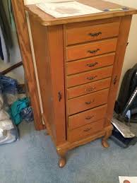Lot 5597powell Oak Jewelry Armoire W 8 Drawers And 2 Side Doors And A Mirror Inside