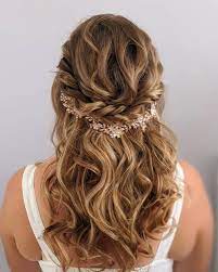 Hair gets frizzy because it sucks moisture out of the air; Beautiful Beach Wedding Hairstyles That Are Perfect For A Coastal Celebration Southern Living