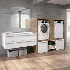 Make some extra storage space in your laundry and install a cabinet. Laundry Cabinet With Space For Washing Machine And Dryer Idfdesign