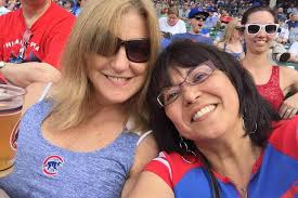 Mystery Woman In Pink Hat Returns Lost License, Credit Cards To Cubs Fan