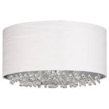 A replacement glass shade can give new life to an outdated ceiling fan. White And Metallic Beaded Pendant