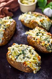 Spinach And Artichoke Dip Baked Potatoes Host The Toast Recipe Baked Potato Potatoes Artichoke Dip