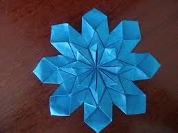 By using paper with different sides the … Roseton Origami Paper Art Origami Stars Origami Crafts