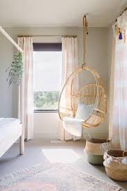 Refresh your study space with new desks, desk chairs & more. Pink Stripe Curtains Accent Bedroom Windows Featuring A Corner Anthropologie Woven Hanging Chair Bedroom Swing Room Swing Bedroom Hanging Chair
