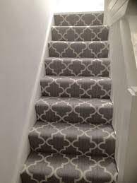I've always wanted a carpet runner but with young children and messy, muddy shoes, i've put off considering one for the last 7 or so years, choosing instead a practical beige carpet (and i don't do beige!). New Stair Carpet Axminster Royal Wilton Collection Windsor Trellis Mid Steel Grey Geometric Contemporar Patterned Stair Carpet Carpet Stairs Carpet Staircase