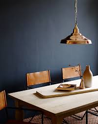 Inspiration Moody Blue Accent Wall With Bright Copper Pendant Over Dining Table Modern Dining Room Interior Design Interior