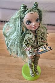 Rainbow High Olivia Woods Articulated Fashion Doll Olive Green 2023 Series  5