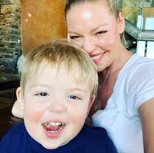 Funny faces with Stinkews. He really does love looking at himself in the  camera...or a mirror...or any reflective surface he can find. I guess we're  all a little guilty of that these