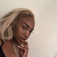 They have this very dark skin and bright blond hair. Follow Fbittiesgetmoney For More Dark Skin Blonde Hair Blonde Hair Black Girls Blonde Hair Girl