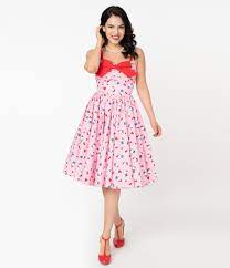 Easter eggs, purple and yellow flowers on pastel blue background. Hello Kitty Clothing And Accessories Unique Vintage