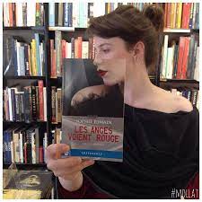 The book's spine should once again be vertical. French Bookstore Blends Real People S Faces With Book Cover Art Open Culture