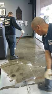 Epoxy Coating Will Quickly Transform Your Garage Into A Home Gym Bar Home Gym Garage Gym Flooring Garage Renovation