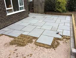 Www Parislawnsandlandscaping Co Uk Wp Content Uploads 2014 12 Paris Lawns And Landscaping Grey Indian St Patio Installation Diy Stone Patio Patio Pavers Design