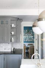 Kitchen remodeling · virtual kitchen · countertop estimator Beautiful Kitchen Features Gray Cabinets Paired With Honed Black Marble Countertops And Linear Mar Black Countertops Grey Kitchen Cabinets White Modern Kitchen