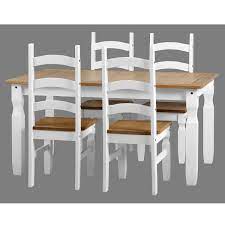 I was able to fit 8 chairs around the table still quite comfortably. Dining Table With 4 Chairs In White Solid Pine Corona Furniture123