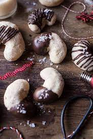 Place 1 to 2 inches apart on the prepared cookie sheets. Chocolate Dipped Vanilla Bean Cashew Crescent Cookies Half Baked Harvest