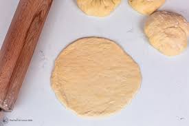 If they're warmed for a minute or two in a medium oven they puff up a bit making them. Easy Pita Bread Recipe How To Make Pita Bread The Mediterranean Dish