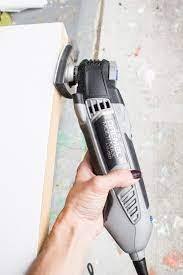 Repeat this process for the other hinges. Fixing An Uneven Door With My Dremel Multi Max Erin Spain