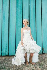 Country Ruffled Wedding Dress With Cowgirl Boots How Cute See More Fall Wedding Ideas On The Blog Shoot Ruffle Wedding Dress Ruffled Wedding Wedding Dresses