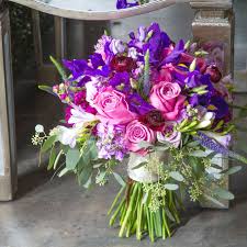 Asides from their practical affordability and beauty. This Wild Iris Bridal Bouquet With Veronica And Freesia Accents Is To Die For What A Special Bride Wedding Flower Design Iris Bridal Bouquet Get Well Flowers