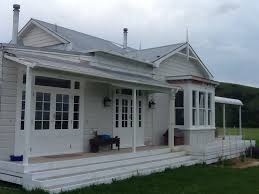 Black And White House Exterior Nz Almost Finished Using Resene Half Truffle For Weather Boards And Resene Black White For Tr Bungalow Exterior Exterior House Colors House Exterior Color Schemes