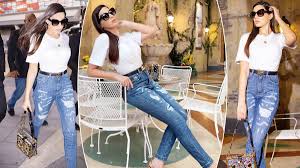 Nora Fatehi Radiates Hotness as She Walks in Ripped Denim And White  T-Shirt, Flaunts Her Expensive Bag - See Stylish Pics