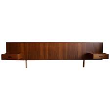 Choose a headboard to match your personal style, whether it be upholstered, wooden, or even carved for a more traditional look. Mid Century Modern King Size Teak Headboard With Floating Nightstands For Sale At 1stdibs