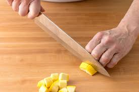 Do this with a sharp pair of garden shears and clip right at the main stem. How To Dice Yellow Squash