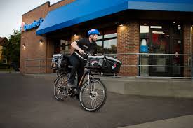 Domino S Embraces Delivery Via E Bike Following In The Footsteps Of Grubhub And Ubereats Pizza Delivery Grubhub Doordash