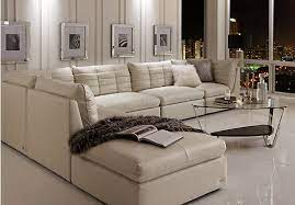 The rug perfectly fits with the room's style. Valleta White Sectional Rooms To Go Living Room Sectional Living Room Sets White Furniture Living Room