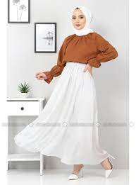 Tight skirts can be uncomfortable or difficult to move in, and wide skirts can lead to embarrassing situations if it's windy day and especially if the fabric is too lightweight. Muslimah Fashion Skirt