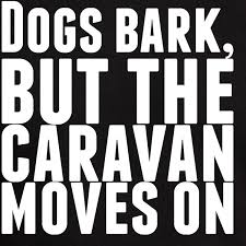 Dogs bark, but the caravan moves on Men's Classic T-Shirt Dogs ...