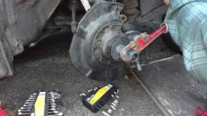 You may need to replace a front wheel bearing. Pt 2 2005 Toyota Sienna Front Wheel Bearing Press In On Car Youtube