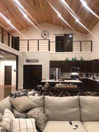 With similar interior finishing to traditional construction, with the exception of having no interior structural walls (yay for extra square footage), our barndominium building kits can be customized to incorporate energy efficient windows, garage and overhead doors, custom interior and exterior finishes, second levels, overhangs, and more. Brookhaven Barndominium Simple And Spacious 40x60 Pole Barn Conversion To Barndominium Barn House Interior Steel Building Homes Barn Style House