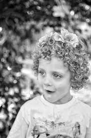 Kids with pin straight hair should steer clear of these little boy haircuts. Black And White Portraits Little Boy Curly Hair Sweet Park Surprise Fun By Jenny Heard Photo Stock Snapwire
