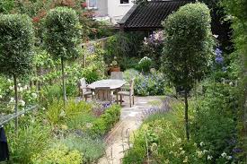Entertaining Space In A Garden In Clifton In Bristol Surrounded By Billowing Borders Of Scented Roses And Perennia Garden Design Landscape Design Narrow Garden