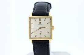 A gold watch is the perfect gift for birthdays, anniversaries or holidays. 18k Gold Square Shaped Omega Wrist Watch Black And Gold 1940s Timekeepers