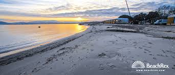 It's on a sandy beach with a lovely sea view. Beach Les Tamaris Grimaud Var France Beachrex Com